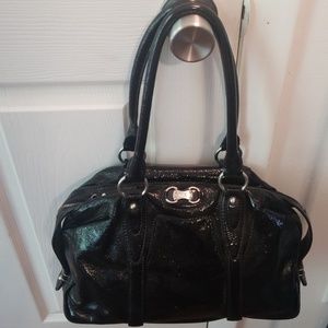 Gently used MICHAEL KORS liquid leather purse